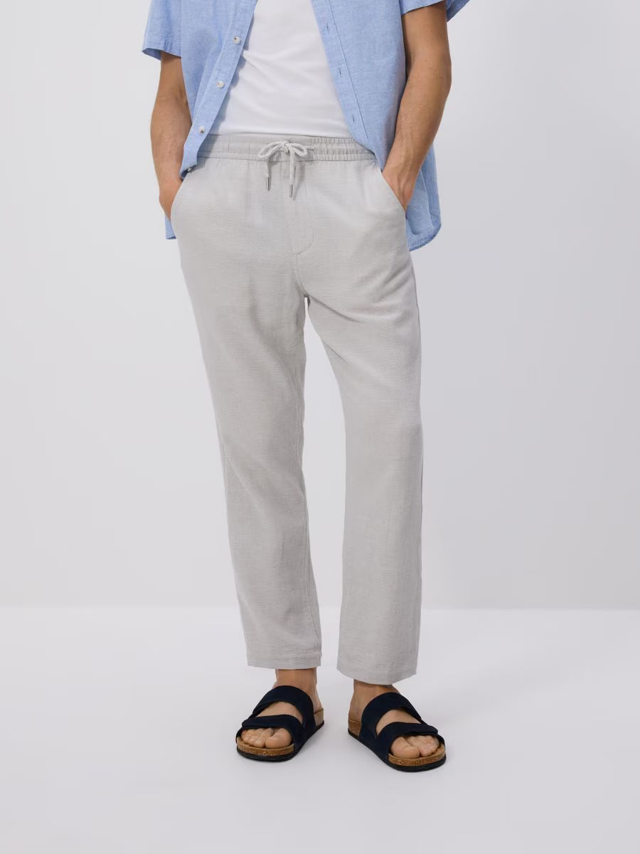 Pantaloni carrot in misto lino