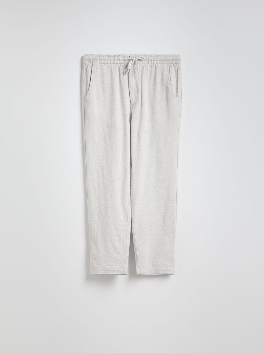 Pantaloni carrot in misto lino