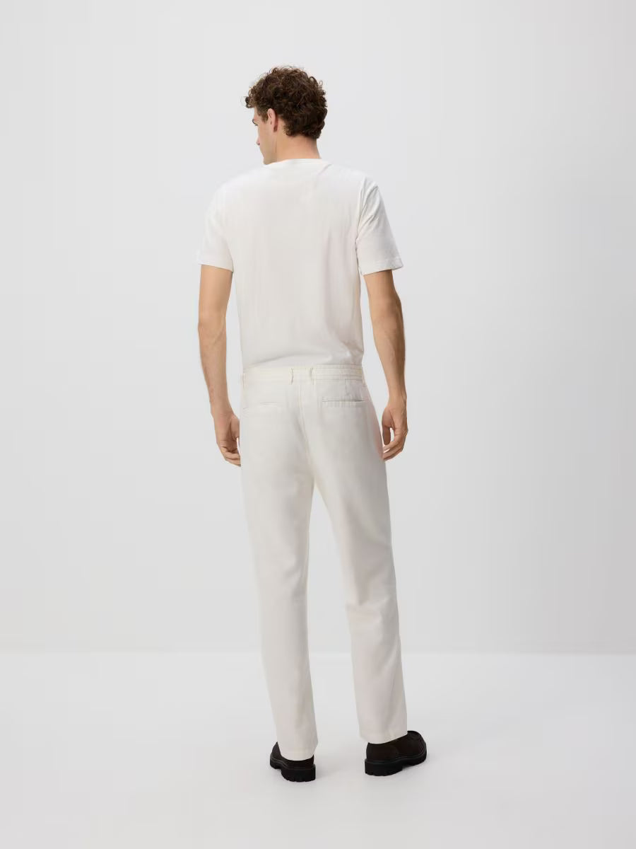 Pantaloni dritti in lino-panna